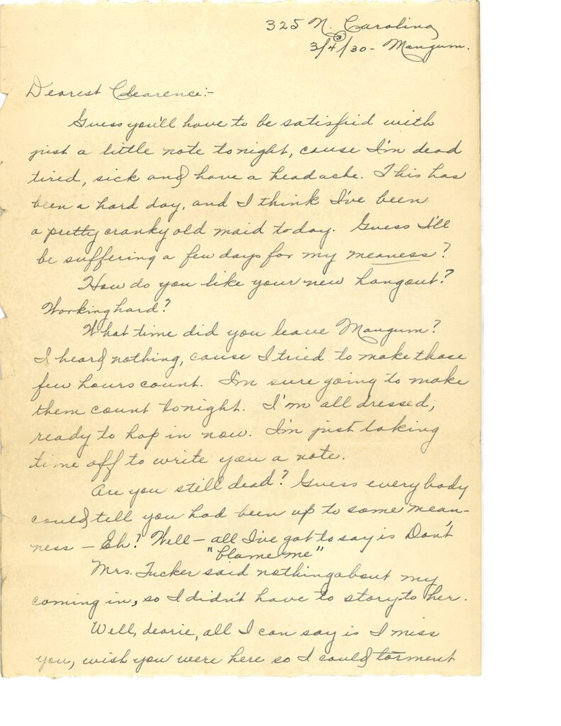 Handwritten letter on lined paper with cursive writing.