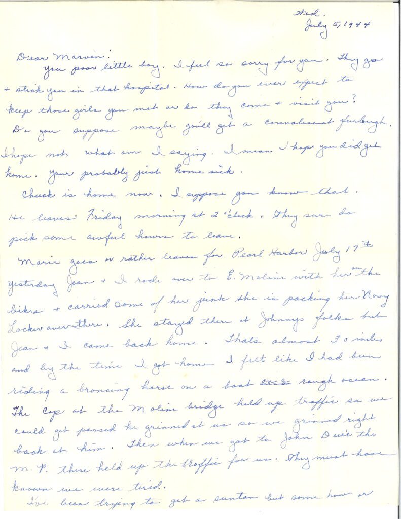 Handwritten letter on lined paper in blue ink.