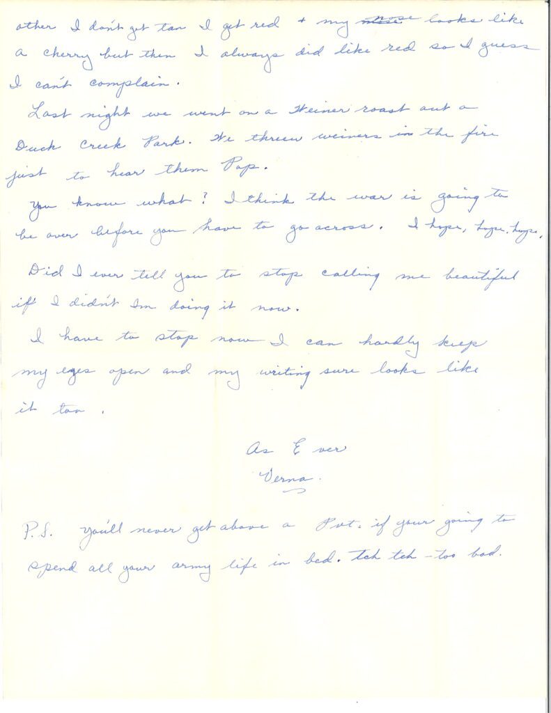 Handwritten letter with blue ink on white paper.