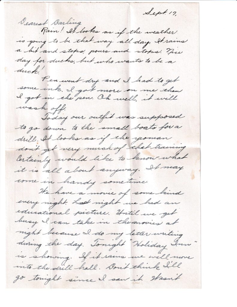 Handwritten letter with cursive script on lined paper.