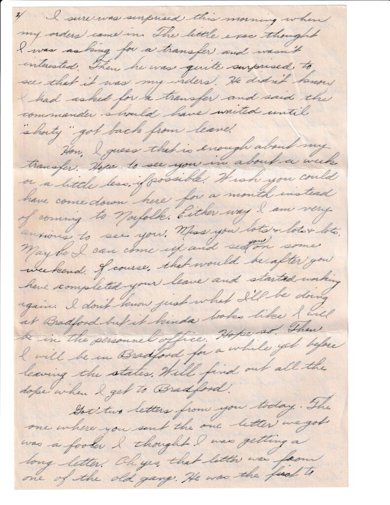 Handwritten letter with cursive script on aged paper.