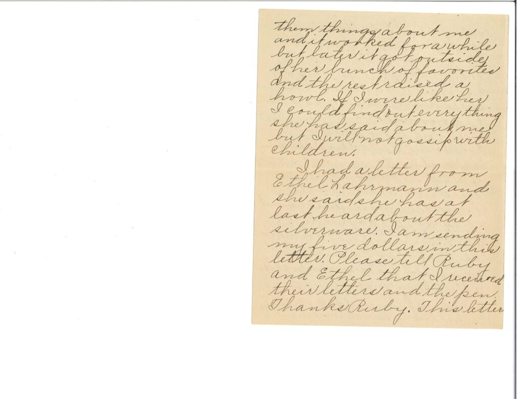 A handwritten letter on aged paper with cursive script.