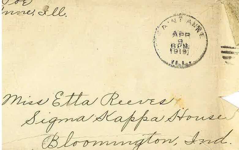 A vintage envelope addressed to Mrs. Etta Reeves in Bloomington, Indiana.