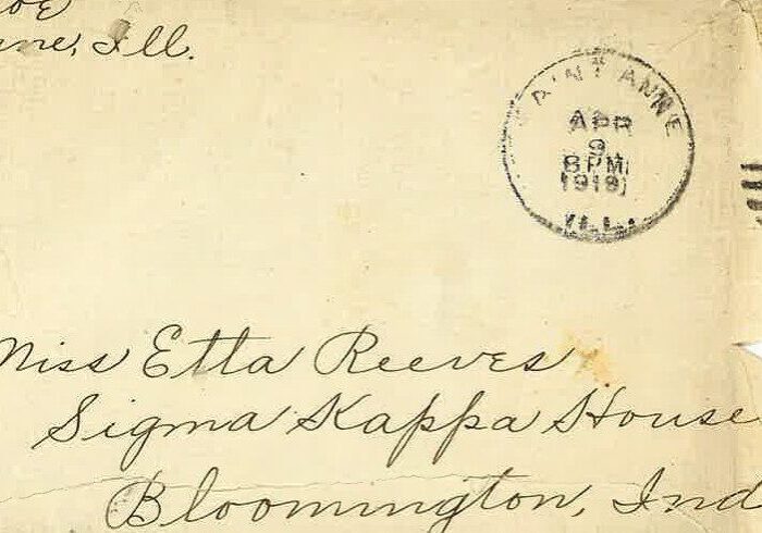A vintage envelope addressed to Mrs. Etta Reeves in Bloomington, Indiana.